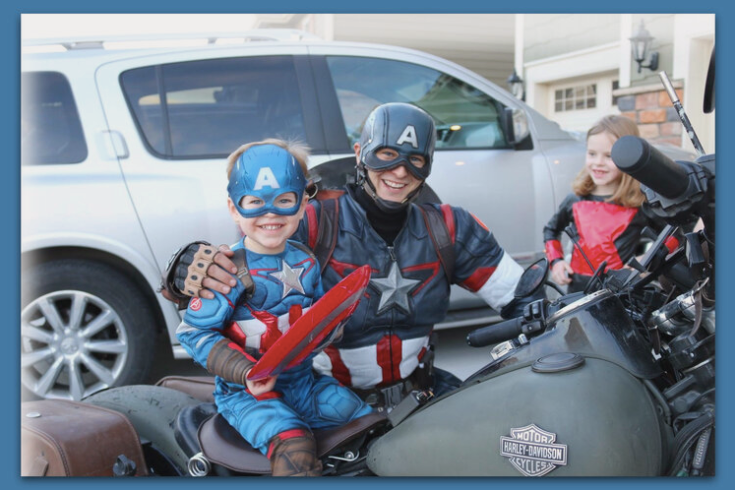 The colorado captain with his motorcycle and little kids